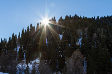the sun in the mountains