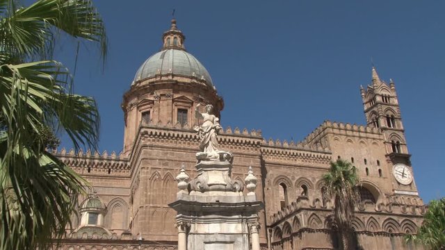 Static shot of the dome, clock and spire of  Palermo Cathedral, in Sicily, Italy