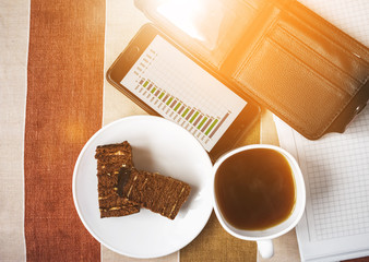 Graph on a smartphone, wallet.