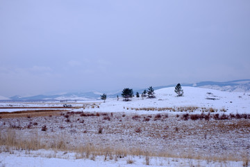 View of snow-covered mountains on a cold day