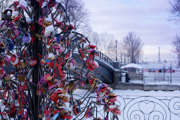 Padlock as a symbol of happiness on a metal tree