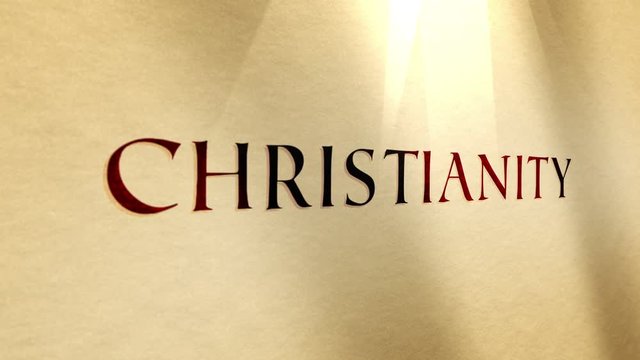 Ancient Parchment Text Close up of the biblical word Christianity