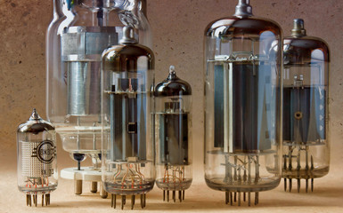 macro shot of old radio lamps on kraft paper background in bi colors.