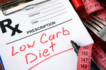 Prescription form with words low carb diet.