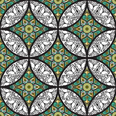 Colorful floral seamless patchwork pattern with mandala in boho chic style, in portuguese and moroccan motif 