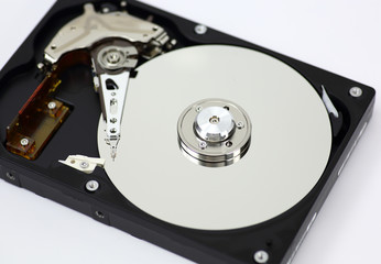 Harddisk drive (HDD) with top cover open isolated on white background