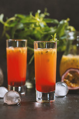 Cold cocktail with passion fruit