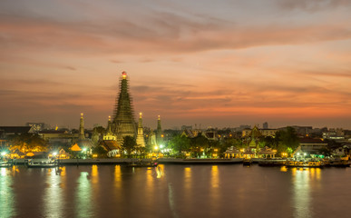 Temple of Dawn pagoda under twilight sky