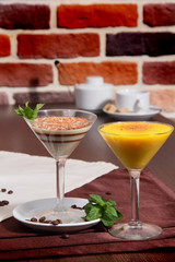 Two wine glasses with dessert..