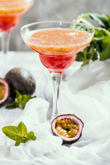 Alcoholic cocktail with fresh passion fruit