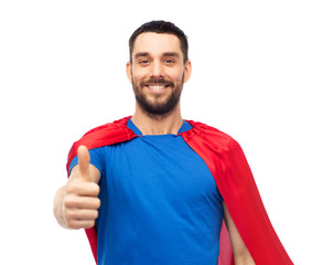 happy man in red superhero cape showing thumbs up © Syda Productions