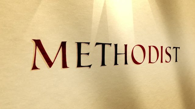 Ancient Parchment Text Close up of the biblical word Methodist