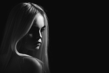 beautiful girl portrait with long blond hair monochrome