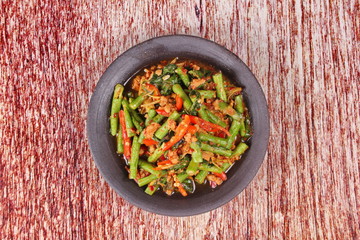 Spicy fried cowpea with minced pork call Pad Ped Tua.