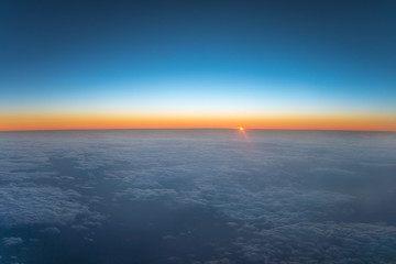 The beautiful cloud cover on the background of sunset