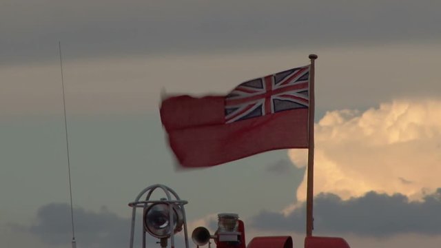 Red ensign flies from a cruse ship tender boat near Zadar Croatia 
