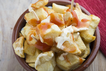 Tapa typical spain Patatas bravas
