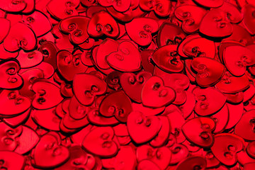 Fototapeta na wymiar Valentines day background of red hearts confetti. Festive Valentine.