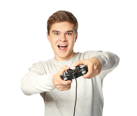 Teenager playing videogame on white background