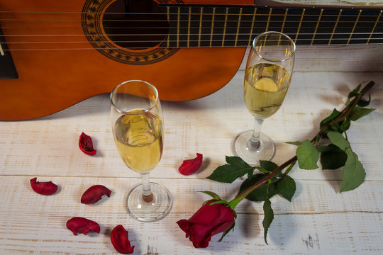 Valentines day with guitar and champagne