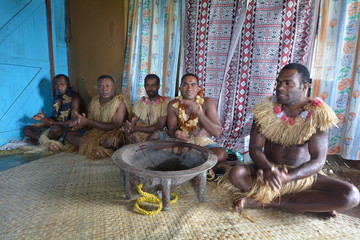 Indigenous Fijians men participate in traditional Kava Ceremony - obrazy, fototapety, plakaty