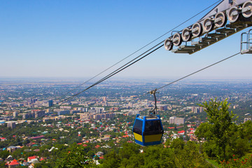 Almaty city view from Koktobe hill and cabin of cable car, Kazak
