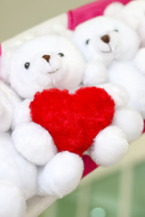 Teddy bear with heart - Stock image