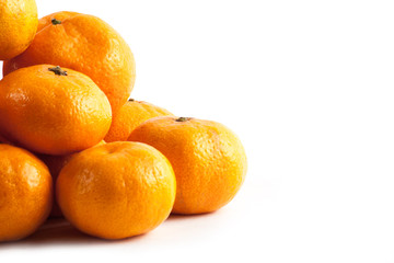 Ripe fresh tangerine isolated on white background