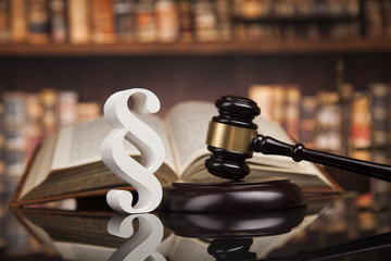 Paragraph, law and justice concept, wooden gavel, mirror backgro