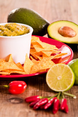 Guacamole and nacho chips. 
