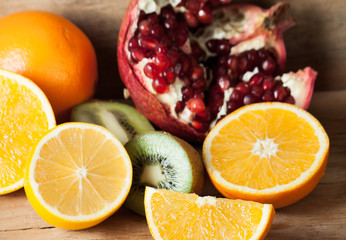 Ripe fresh fruits on wood desk