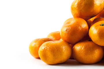 Ripe fresh tangerine isolated on white background
