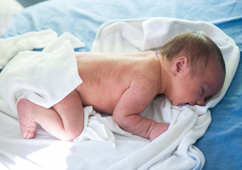 Obraz na płótnie Canvas Newborn baby first days in hospital and home