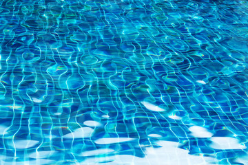 water with sun reflections in pool