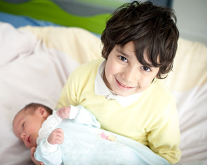 Newborn baby with bigger brother