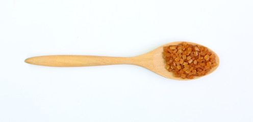 Brown caramelized sugar in a spoon