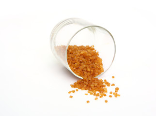 Brown caramelized sugar in a glass jar