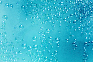 Naklejka na ściany i meble Blue water drops background