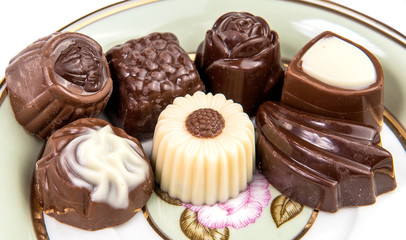 candies cake and cup of tea