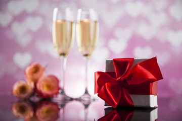 Champagne with Valentines day background and roses, mirror backg