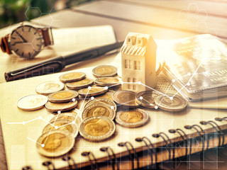 Mortgage concept by money house from the coins,Business Finance and Money concept,Saving money concept to buy a house.