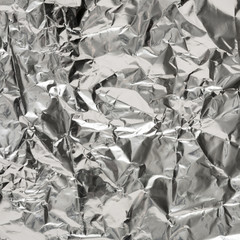 Silver wrinkled foil texture for background