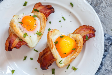 Baked egg breakfast with bacon heart shape for Valentine day