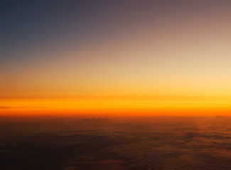 Fototapeta na wymiar Colorful dusk sky from the plane.