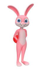 Cheerful rabbit hiding big red heart behind the back against a w