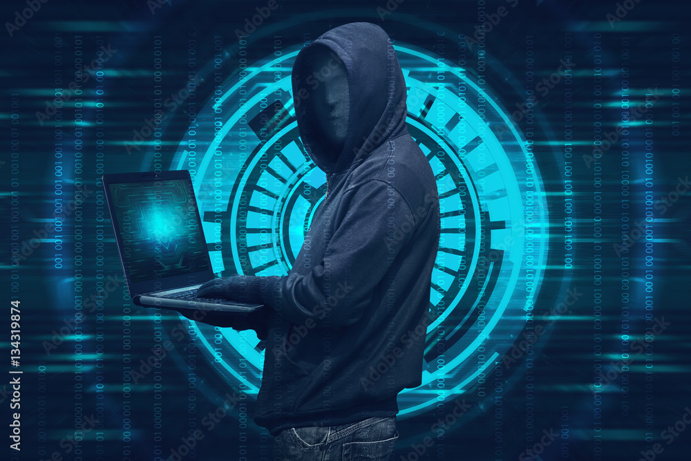 Poster hooded hacker with mask typing on laptop