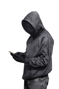 Hacker man with mask using a smartphone