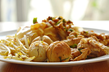 dry rice noodle paste with pork ball on plate