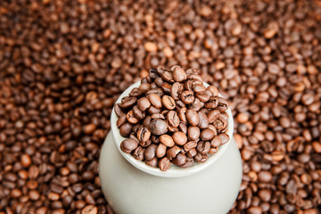 Pot of coffee beans. A traditional drink.