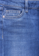 The pockets of denim pants.